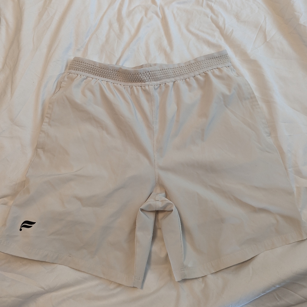 Fabletics Fundamental Short in white and neon green.  Price includes both shorts